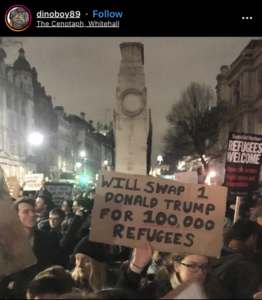 Protest sign reading "Will swap 1 Trump for 100000 refugees" in front of the Cenotaph, White Hall, from Instagram.