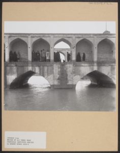 Item from the Conway Library, two black and white images of people standing on the bridge, under the arches.