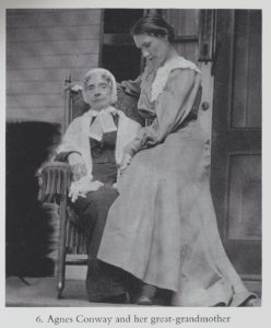 Teenage Agnes sitting on her grandma's lap.