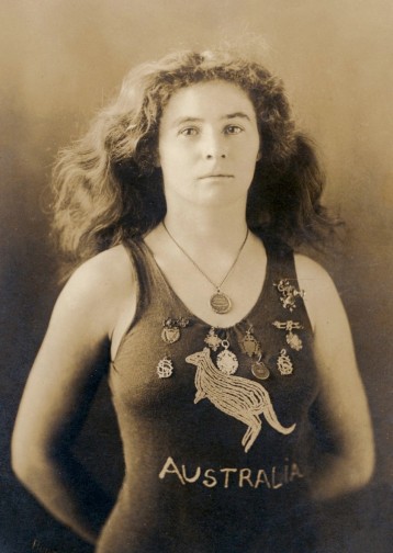 Beatrice Kerr, 1907, toured Britain from 1906-1911 as 'Australia's champion Lady diver' in her patriotic, though fairly risqué swimsuit. Image via National Library of Australia.
