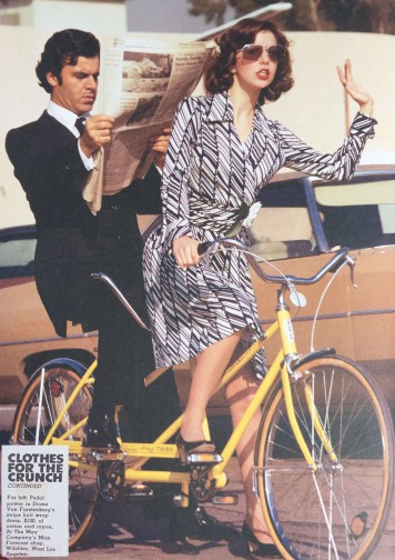 Advertisement for Diane Von Furstenberg’s wrap dress. A woman cycles herself and a man who reads the newspaper. May Company Catalog, 1974. Photograph: Peter Kredenser. Accessed via Journey of a Dress Exhibition catalog, 22. 
