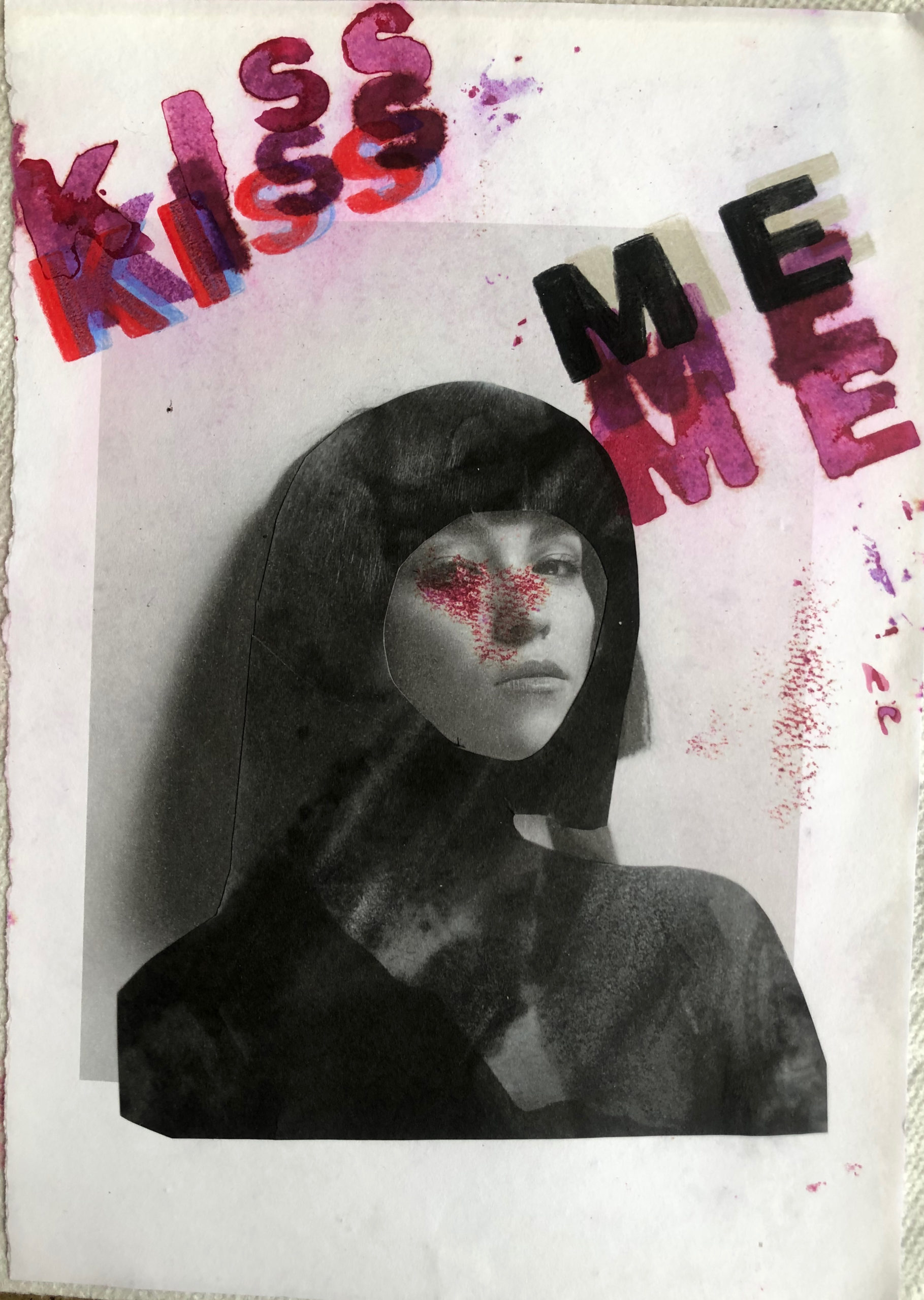 A woman's three-quarter profile with the words 'KISS ME' printed over her image