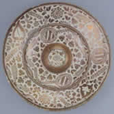 Dish Tin-glazed earthenware, painted with lustre