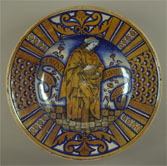 DIsh with one of the Magi painted in the centre