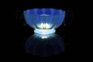 light shining through the bowl on a dark background