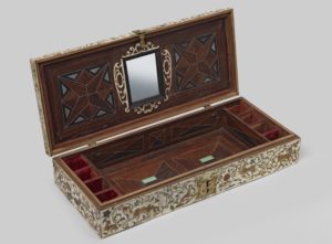 The inside of the painted ivory marriage casket object