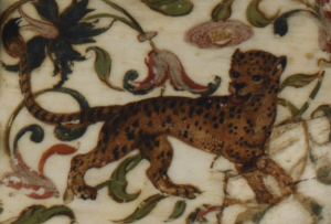 detail of a leopard decoration on ivory casket