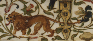 detail of a lion decoration on ivory casket