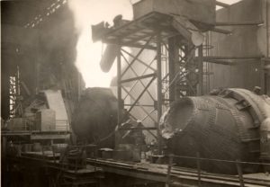 Black and White photograph of steel works showing bessemer converters