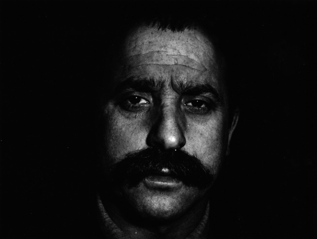 Black and White photo portrait of artist César