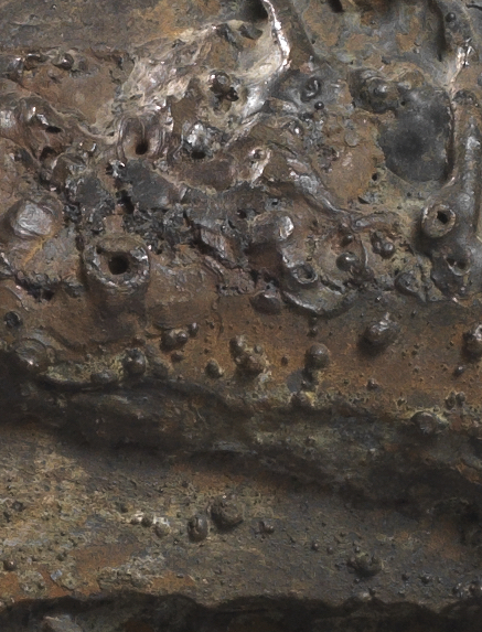 Close Up of Habitation sculpture showing burst metal bubbles from gases trapped during welding