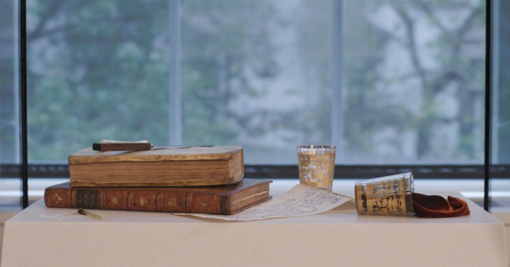 Final display of glasses and books