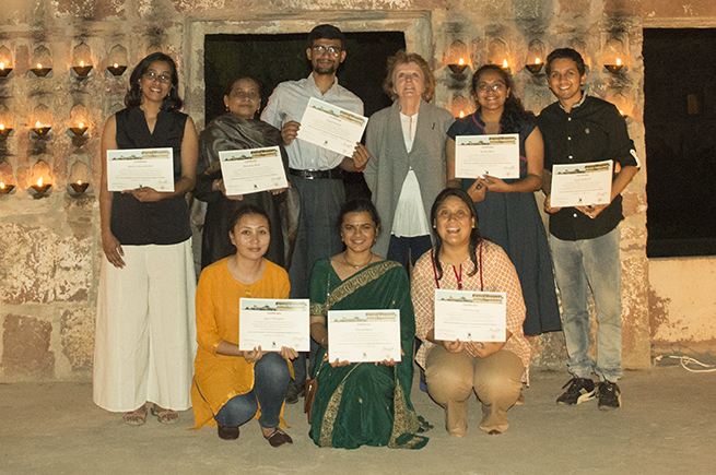 group picture students holding certificates