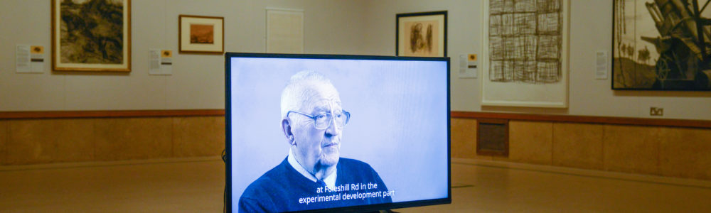 A tv screen shows the film made by young volunteers in the Radical Drawing exhibition space